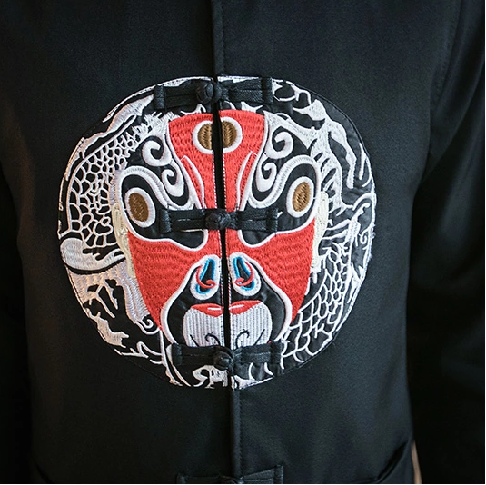 中國傳統(tǒng)元素臉譜刺繡福連文苑唐裝