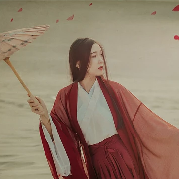 沙漠紅衣帶傘女生頭像，唯美古風真人頭像