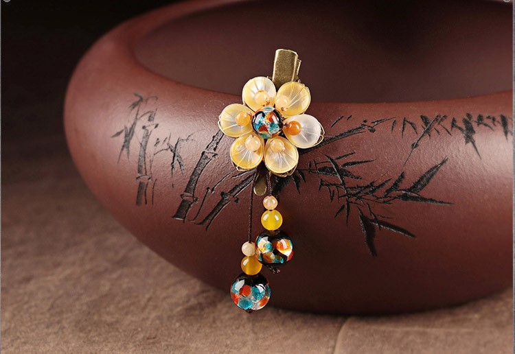 陽光花朵發(fā)夾，清新淡黃花頭飾