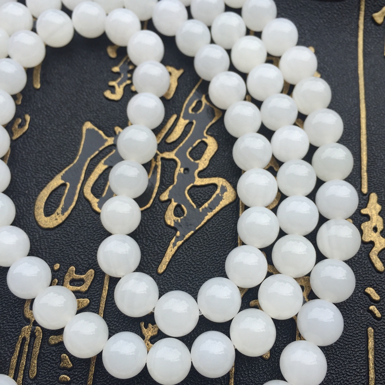 黃巖島無(wú)瑕水透玉化貝殼手串