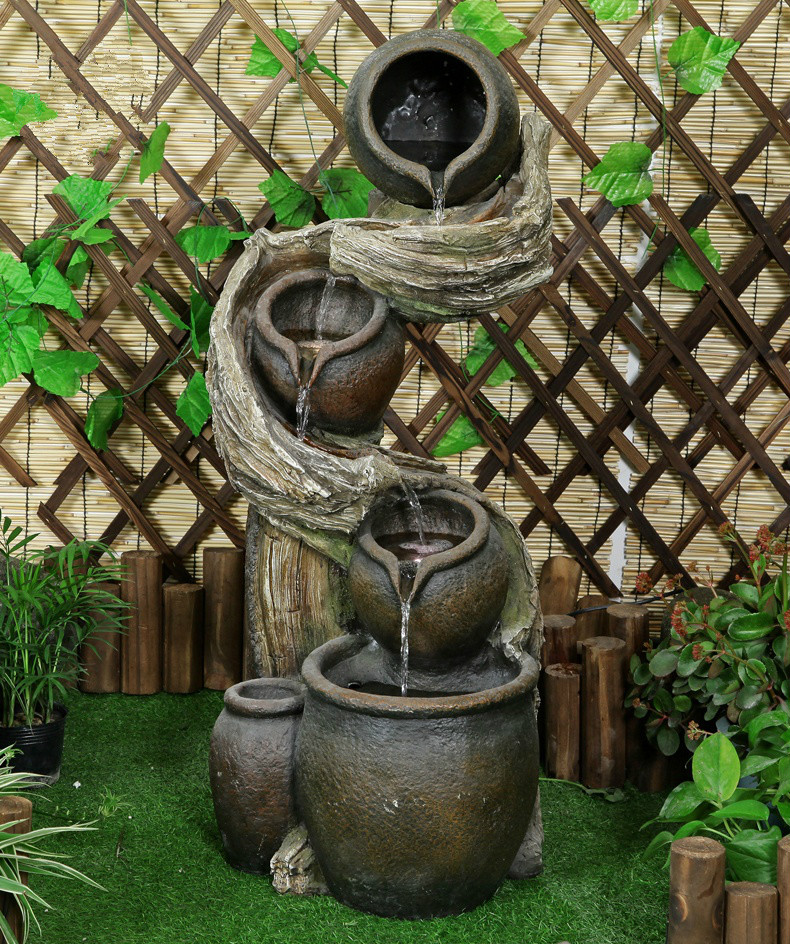 聽涓涓細流的假山，看水鄉(xiāng)故事假山石