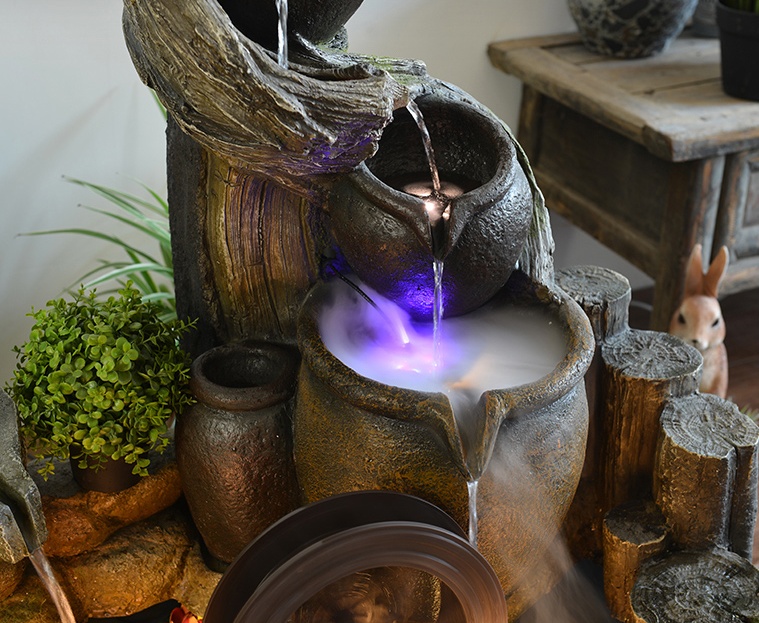 聽涓涓細流的假山，看水鄉(xiāng)故事假山石