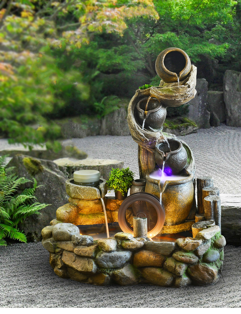 聽涓涓細流的假山，看水鄉(xiāng)故事假山石