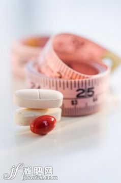 藥,健康保健,文字,室內(nèi),卷尺_82087965_Vitamins and Tape Measure_創(chuàng)意圖片_Getty Images China